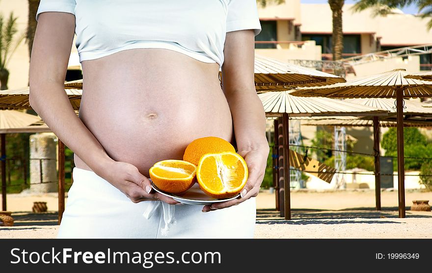 Happiness pregnant women in the white