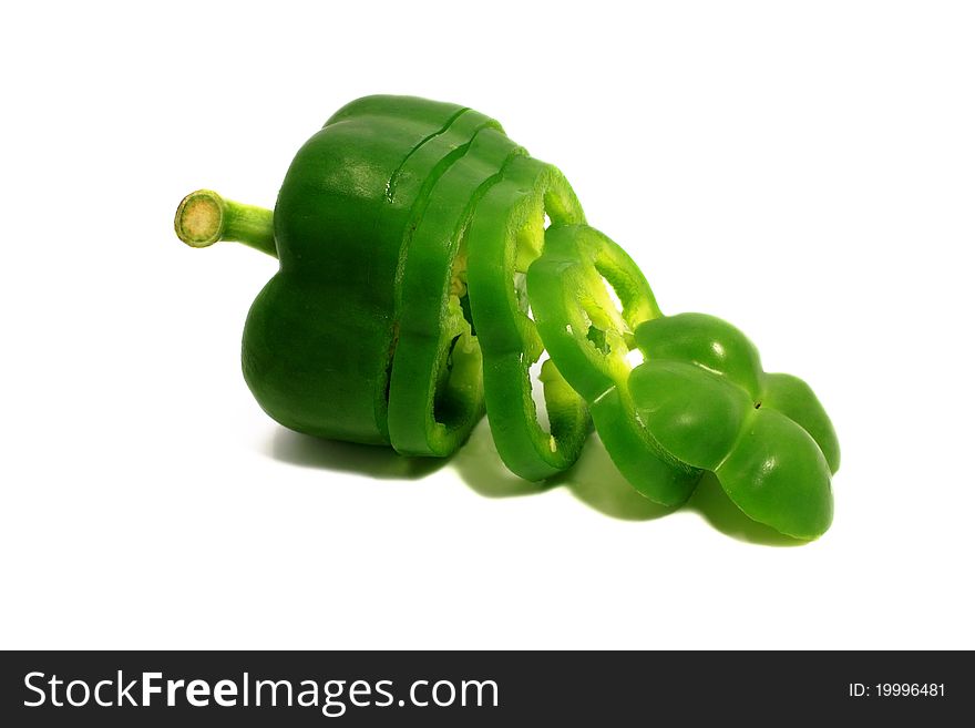 Green cut sweet pepper isolated on white. Green cut sweet pepper isolated on white