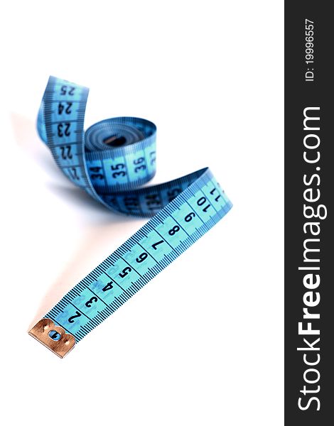 A blue measuring tape isolated. A blue measuring tape isolated