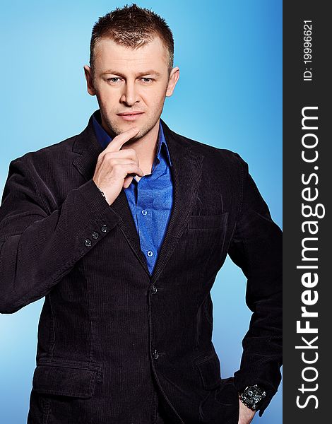 Portrait of a handsome man in a suit. Studio shot. Portrait of a handsome man in a suit. Studio shot.