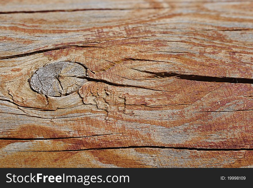 A piece of wood with the top out of focus for copyspace