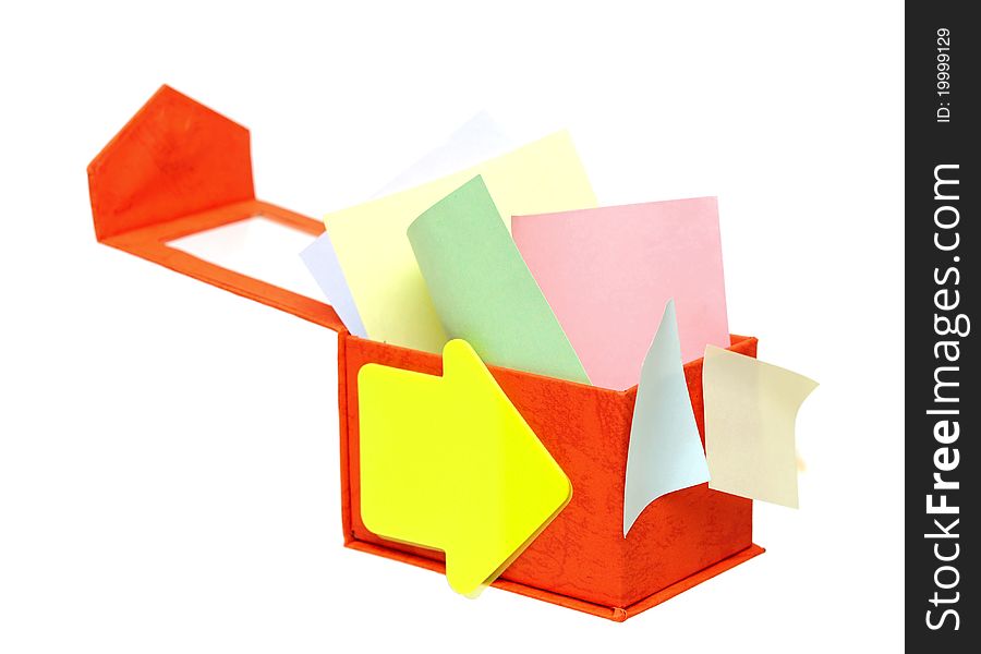 Open box with color reminder notes on a white background.