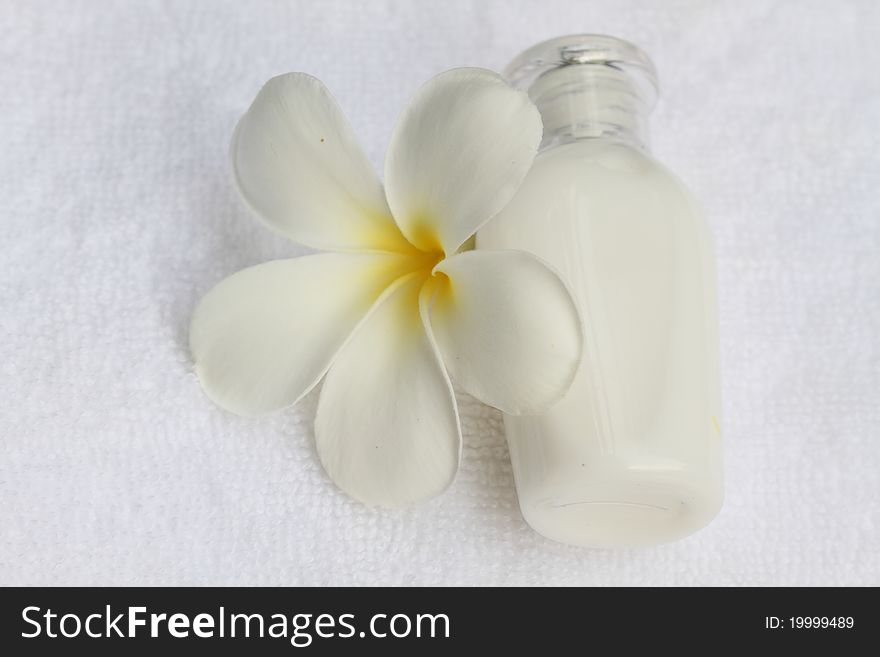 Spa collection ,Plumeria flower and white towel. Spa collection ,Plumeria flower and white towel