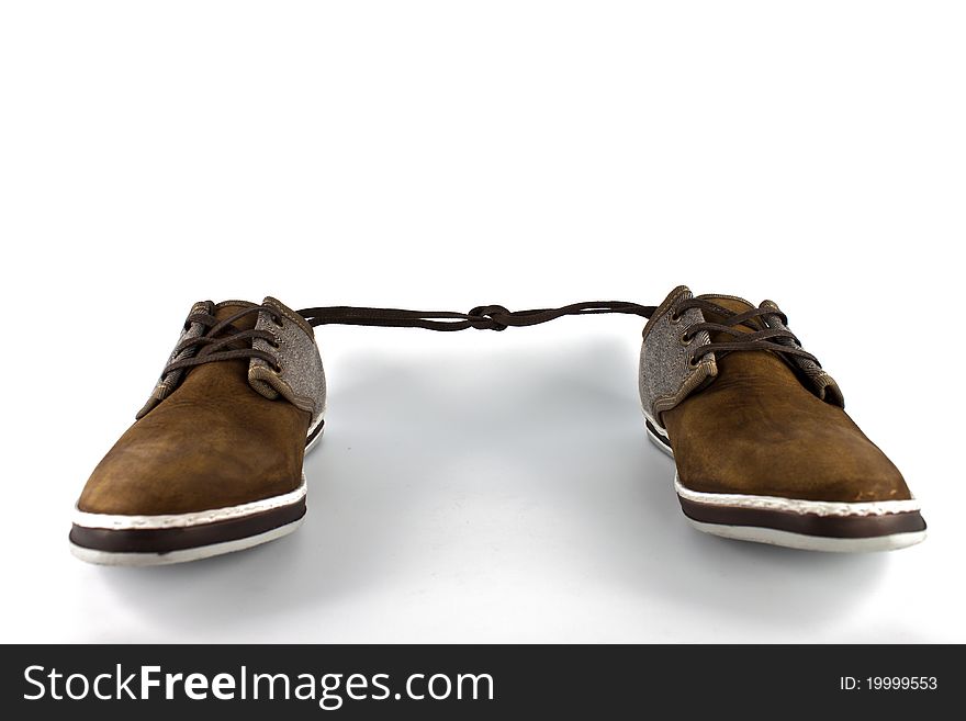 Couple of brown shoes in white background. Couple of brown shoes in white background