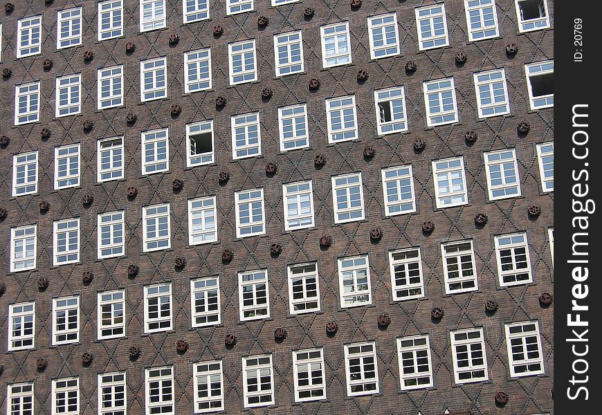 Facade of a brick building in Hamburg, Germany. Facade of a brick building in Hamburg, Germany.