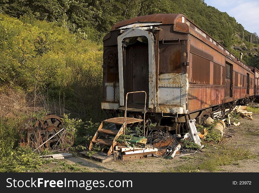 An old retired train sits in its final resting place. An old retired train sits in its final resting place