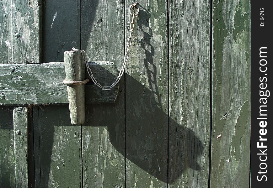 wooden lock at a farm building. wooden lock at a farm building