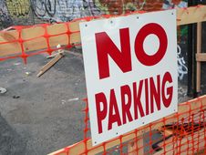 No Parking Sign In A Neighborhood With Graffiti Royalty Free Stock Photo