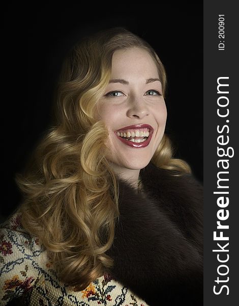 Smiling Woman In A Fur Collared Jacket