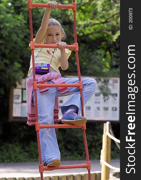 Girl on the red ladder. Girl on the red ladder