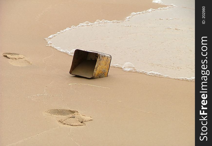 Tin can on the beach