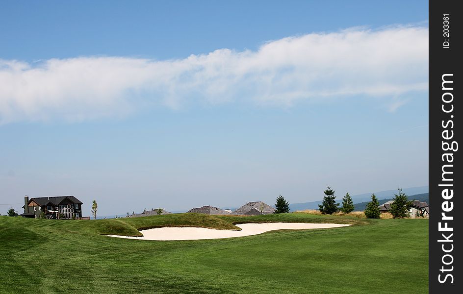 An Incrdible view of a golf course , sandtrap and neighboring home. An Incrdible view of a golf course , sandtrap and neighboring home.