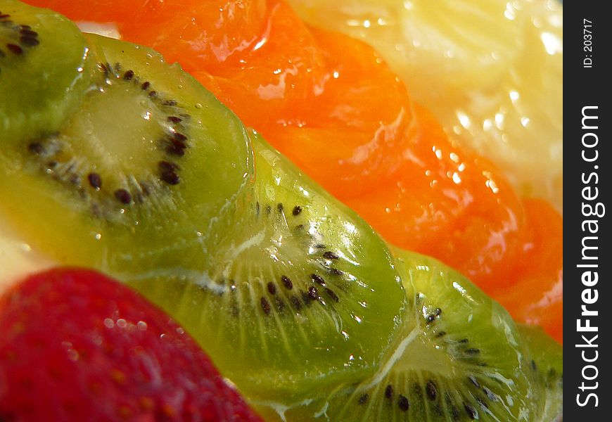 Closeup of of fruit topping on fruitcake. Closeup of of fruit topping on fruitcake