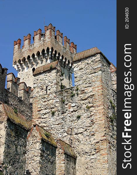 Very old, nice battlements of a castle in Sirmione, a small place in Italy.