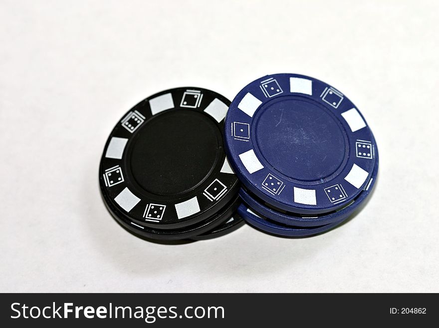 Poker chips that are shuffled. Poker chips that are shuffled.