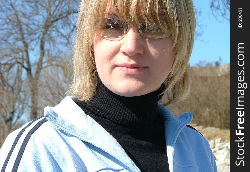 Blond girl looking into the camera