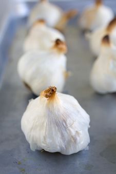 Garlic Bulbs Roasted On A Roasting Pan Stock Images Garlic Bulbs Roasted On A Roasting Pan Stock Images