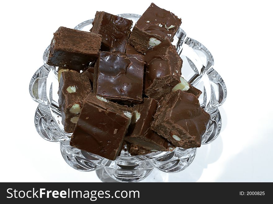 Home made milk chocolate almond fudge in crystal bowl