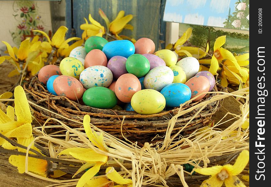 Easter Nest with Candy Eggs and forsythia wreath