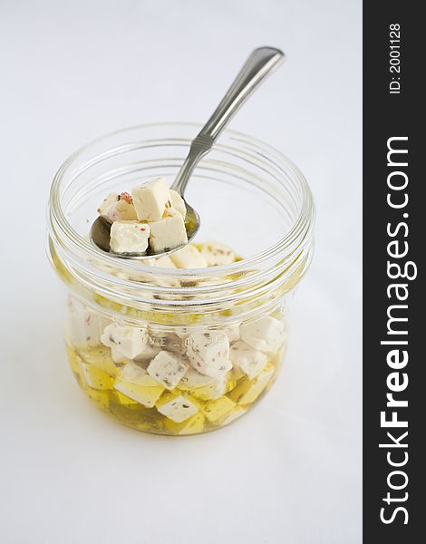 Feta Cheese marinated in olive oil and herbs. Feta Cheese marinated in olive oil and herbs
