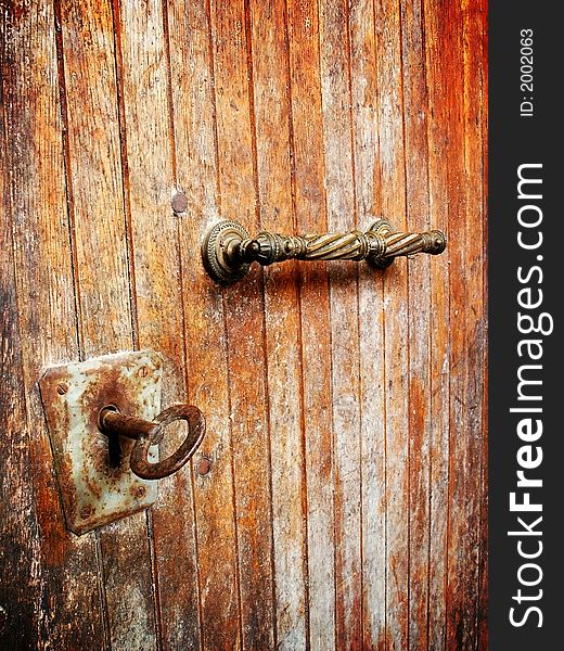 Old iron lock on old doors. Old iron lock on old doors