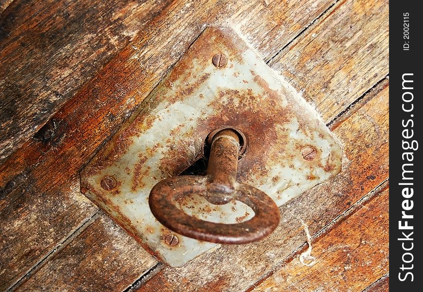 Old iron lock on old doors. Old iron lock on old doors