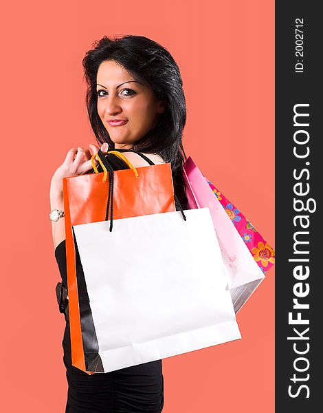 Brunette woman with shopping bags
