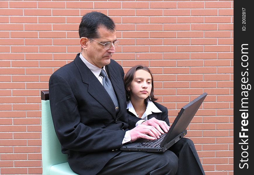 Teacher & Students, showing in a laptop