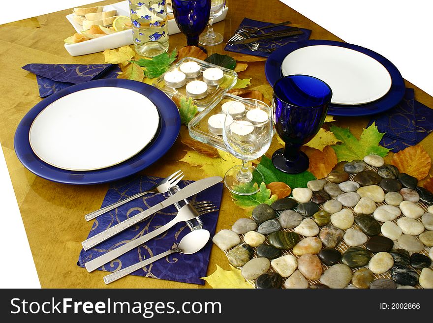 Laid table for two person with autumn leaves. Laid table for two person with autumn leaves