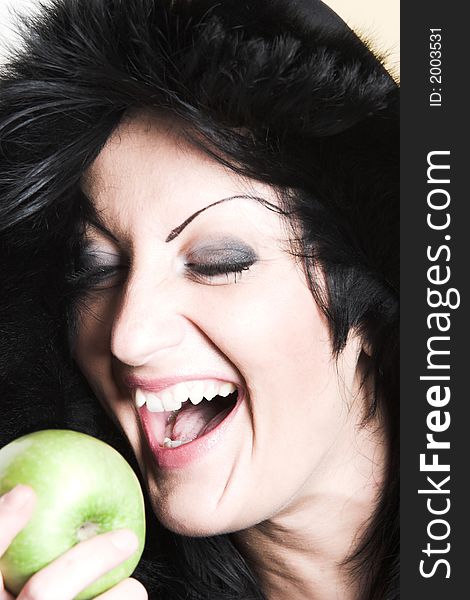 Woman with green apple