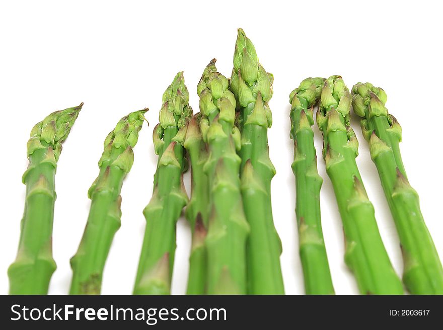 Shot of asparagus level on white