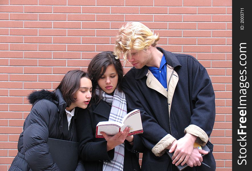 Teacher & Students, reading a book