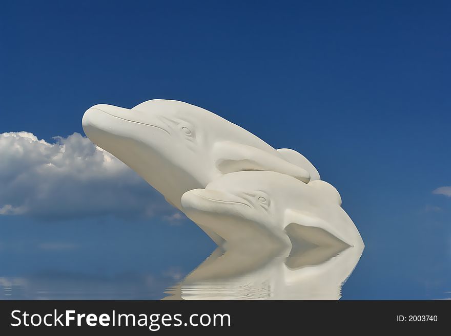 Happy dolphins from white greek marble