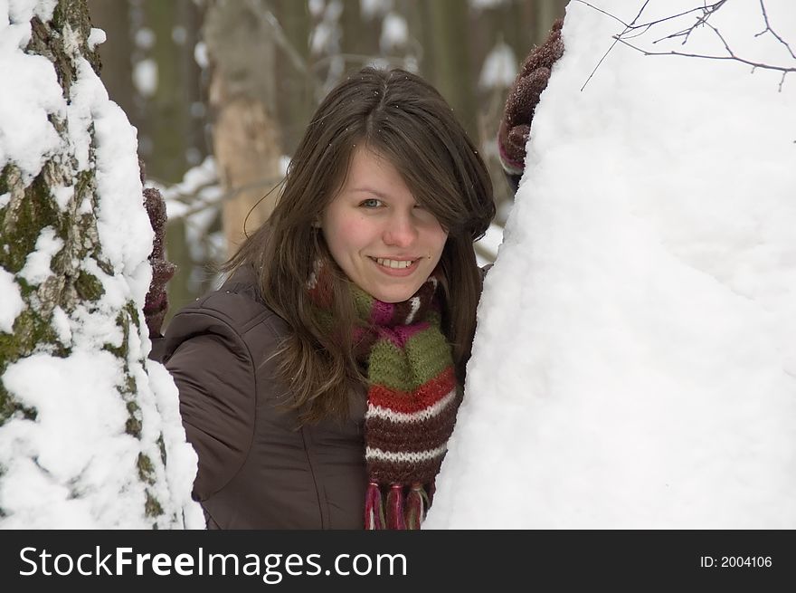 Young pretty woman in the winter forest. Young pretty woman in the winter forest