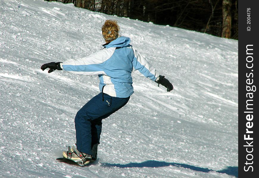 Snowboarding on the beautiful mountin