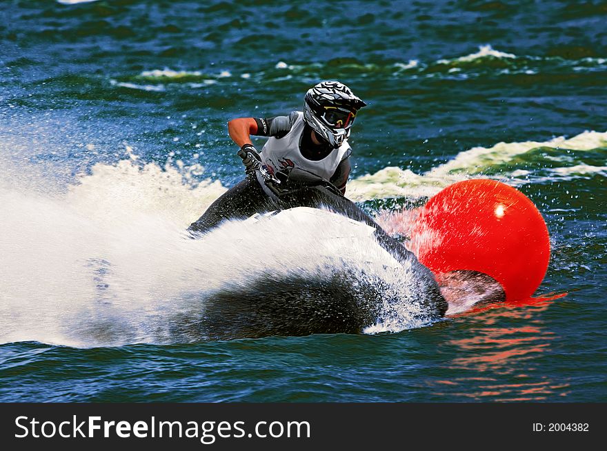 Jetbike rushes on waves with big speed so sparks fly