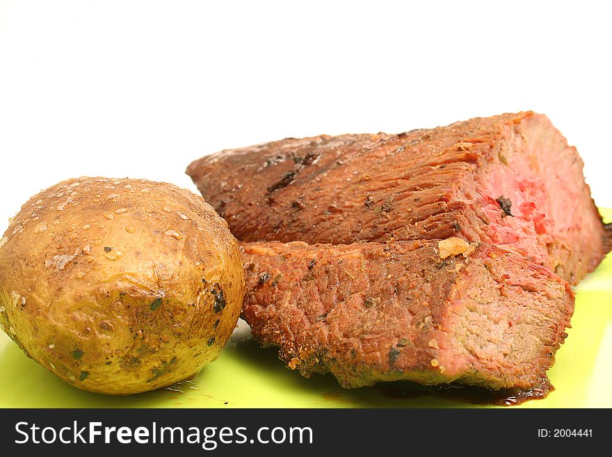 Shot of a potato & steak