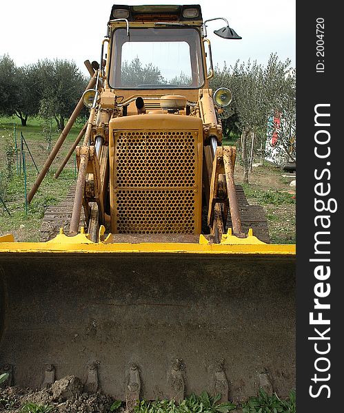 A yellow dozer unused for a long time. A yellow dozer unused for a long time