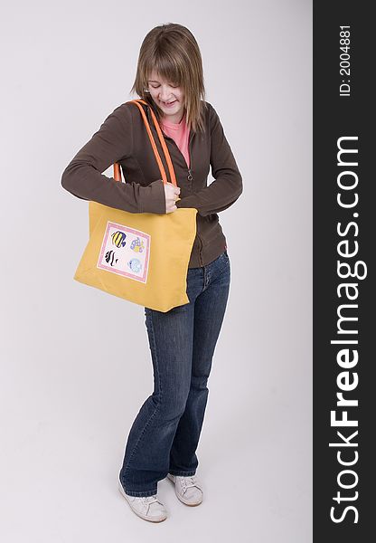 Teen Girl With A Yellow Bag