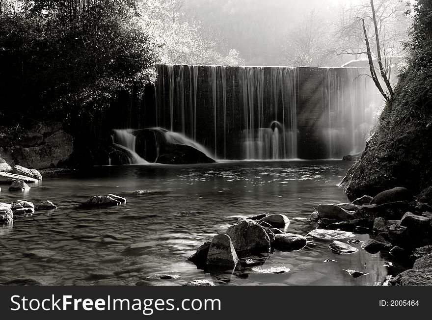 Scenic waterfall stream in silky effect.