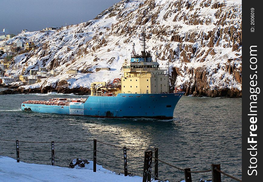 A supply boat that delivers supplies to offshore oil rigs. A supply boat that delivers supplies to offshore oil rigs