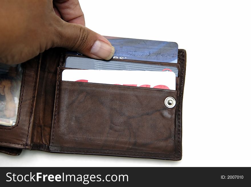 Hand holding some credit card in a wallet. Hand holding some credit card in a wallet