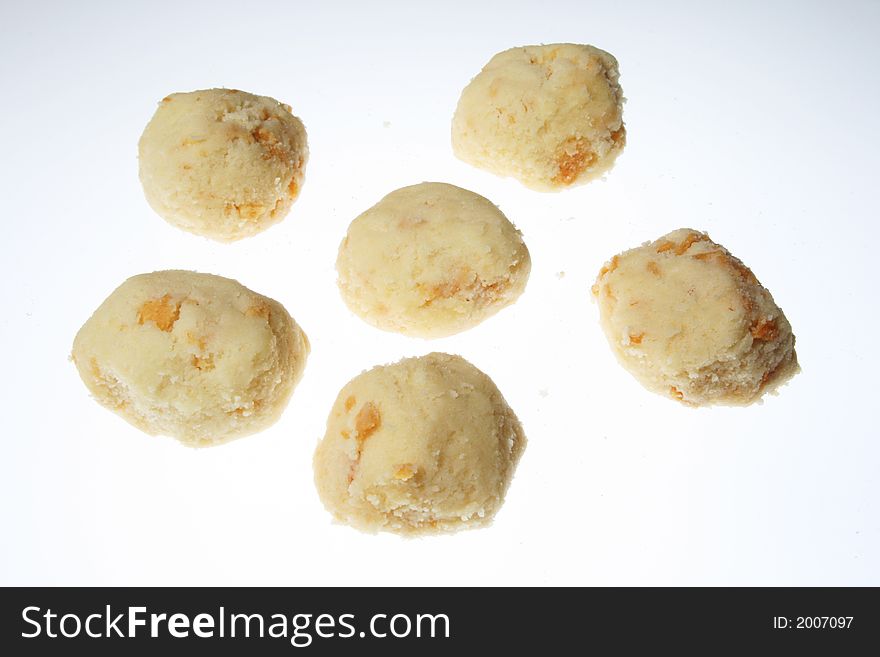 peanut cookies arranged on white background