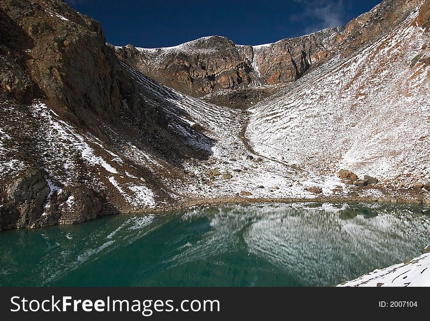 Turquoise lake and mountains. Altay. Russia.