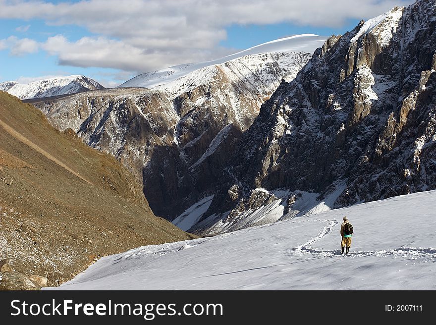 Mens, mountains and glacier. Altay. Russia.