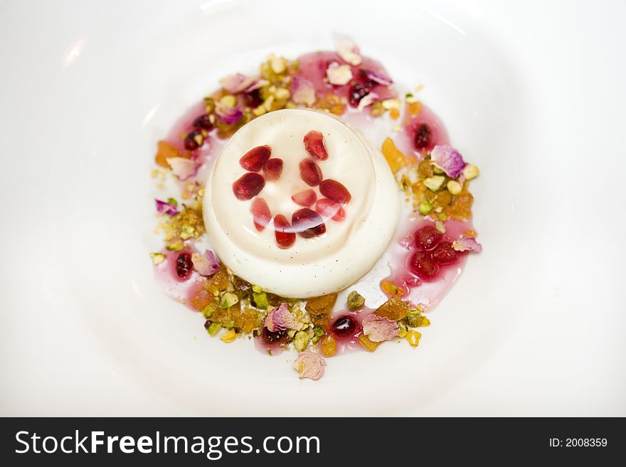 Creme berry dessert at nice restaurant on plate