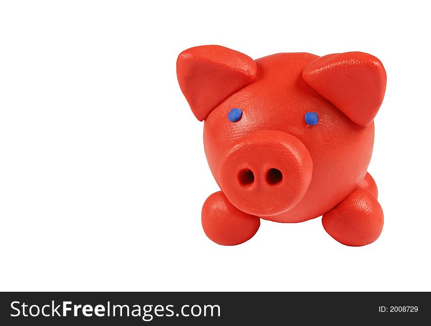 Photo of a red piggy bank, isolated on white