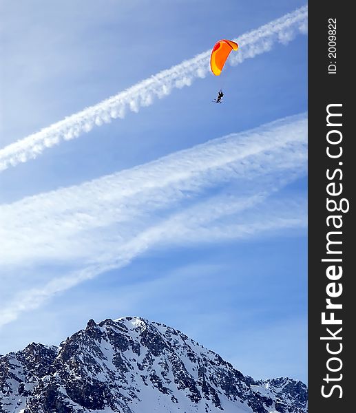 Glider Above Snowed Peak