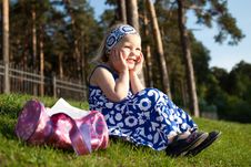 Merry Beautiful Girl Sitting On Green Grass Stock Images Merry Beautiful Girl Sitting On Green Grass Stock Images