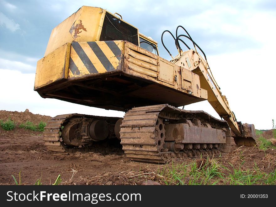 Digger, Heavy Duty construction equipment parked at work site